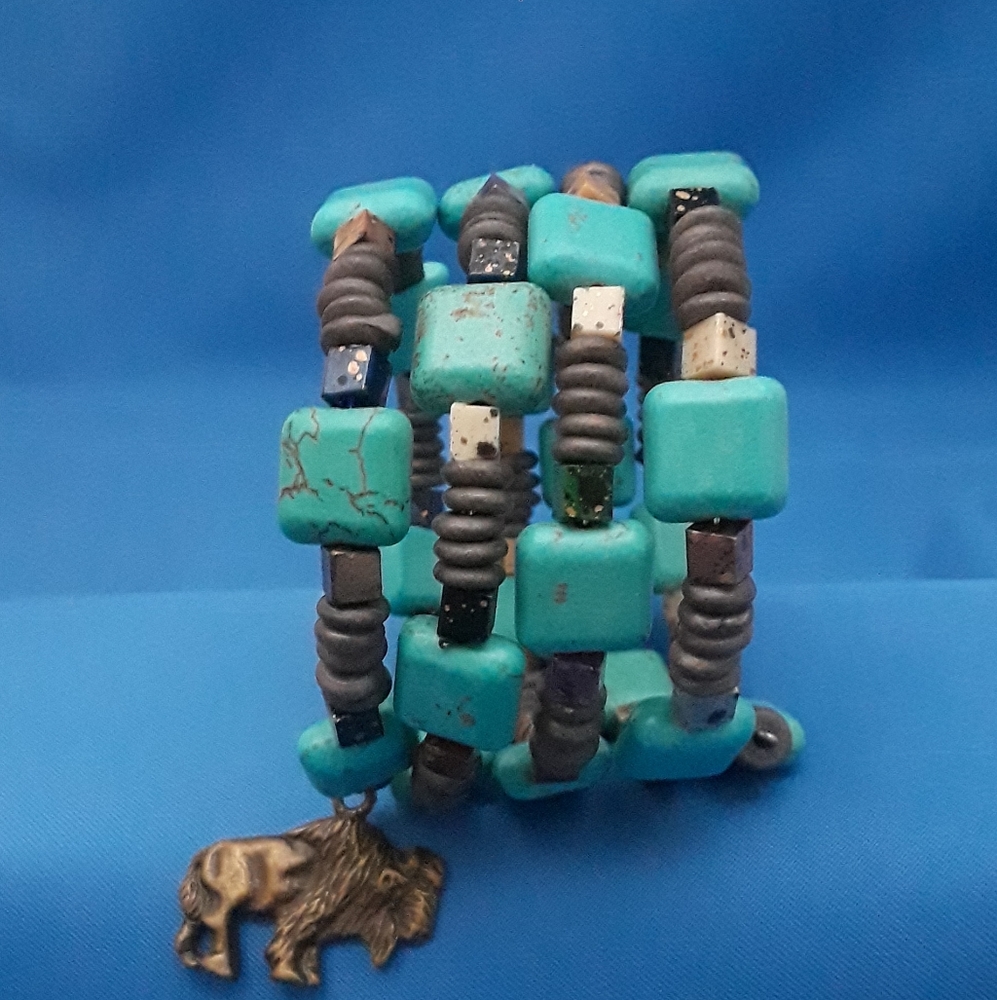 Handmade bracelet with charm.